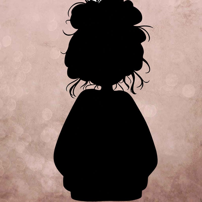 girl with baggy sweatshirt and messy bun