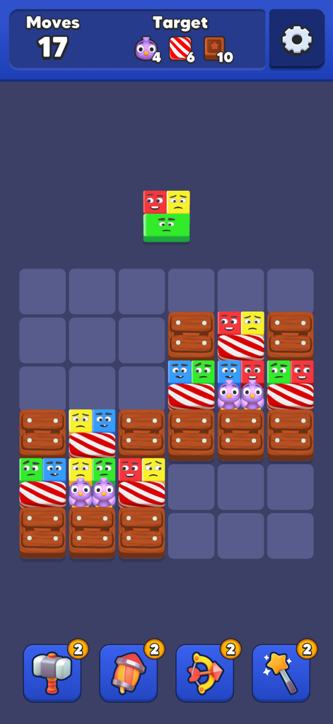Gameplay view of Drop Jelly puzzle showing colorful jelly blocks and targets