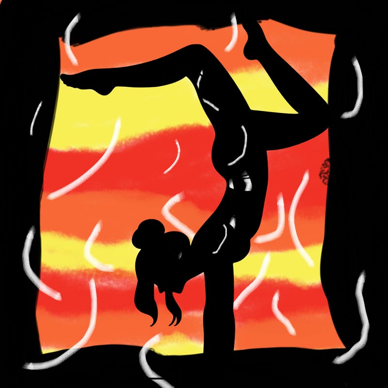 a woman doing a handstand