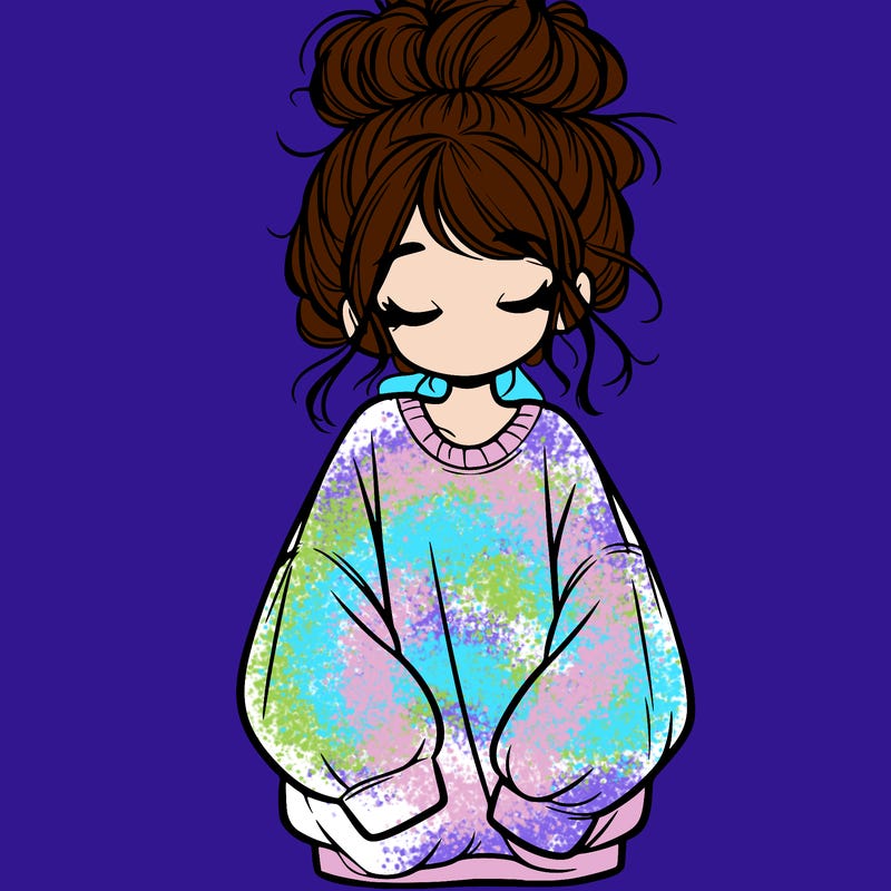 girl with baggy sweatshirt and messy bun