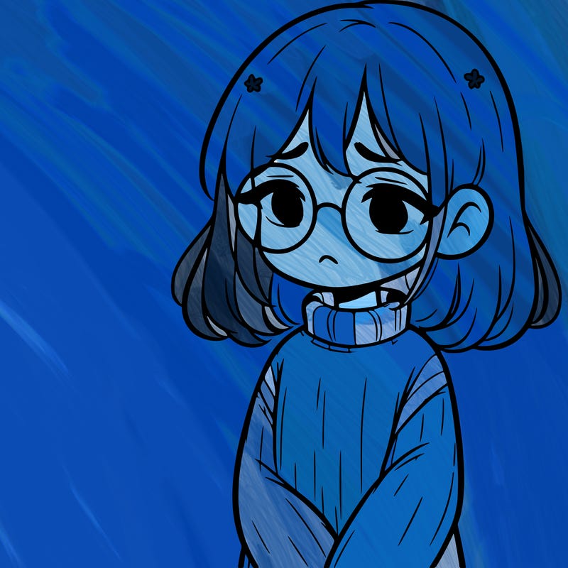 sad girl with glasses in a sweater
