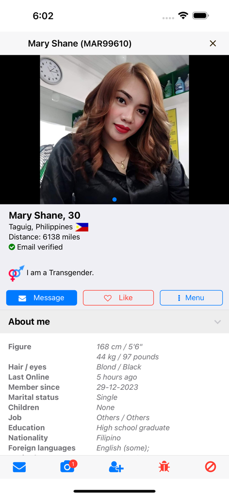 User profile screen in the Ladyboykisses Dating app featuring a woman from the Philippines named Mary Shane.