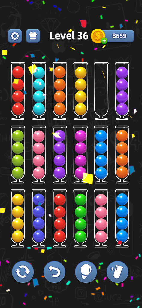 Screenshot of Ball Sort Color Games showing colorful balls sorted into glass tubes on Level 36 with confetti effects.