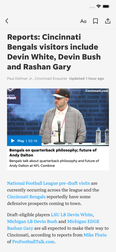 Cincinnati Sports - Cincinnati Sports app interface showing a news article about the Cincinnati Bengals team updates.
