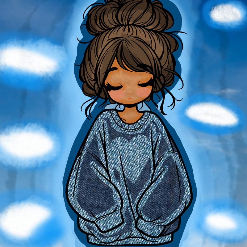 girl with baggy sweatshirt and messy bun