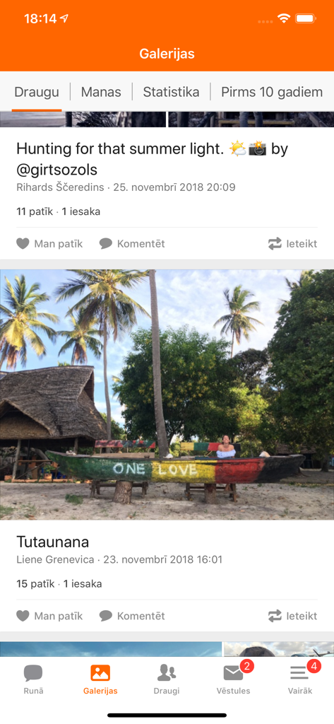 Interface of the Draugiem app showing the galleries section with a photo of a beach scene and Latvian text.