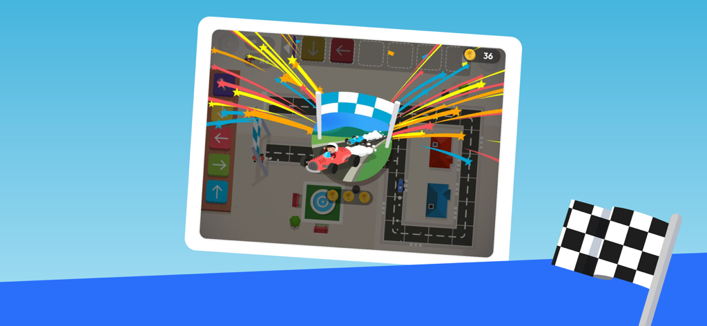 Un coche de carreras cruzando la línea de meta con estrellas coloridas en el juego educativo Code Karts