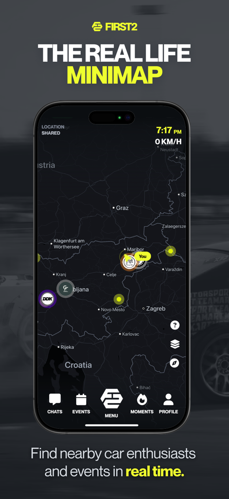 A smartphone displaying the FIRST2 app's real-time minimap feature for finding car enthusiasts and events.