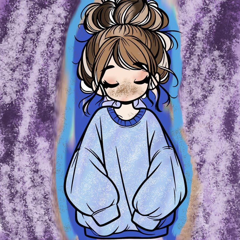 girl with baggy sweatshirt and messy bun