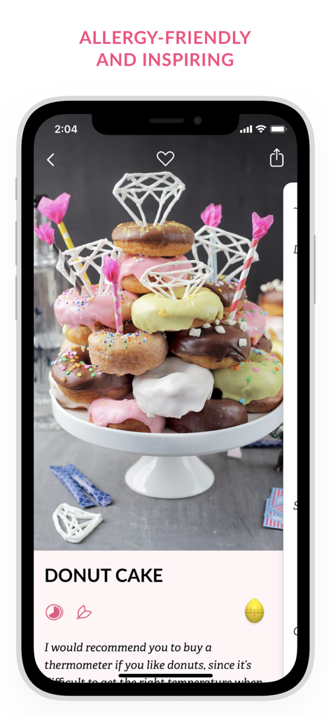 Swedish Vegan Dessert Recipes - A smartphone screen displaying a vegan donut cake recipe with a stack of colorful glazed donuts