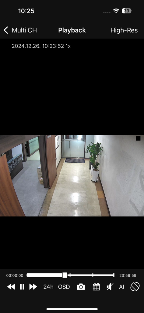 WebEye - WebEye mobile app interface displaying a high-resolution video playback of a security camera monitoring an office hallway