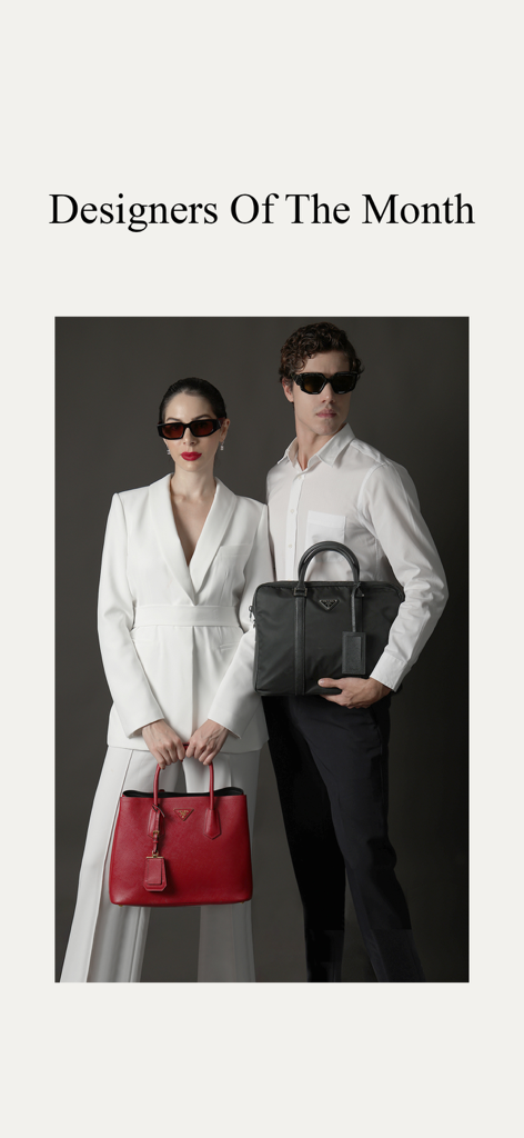 Darveys Luxury Shopping - Man and woman in luxury business attire showcasing designer bags for Designers of the Month