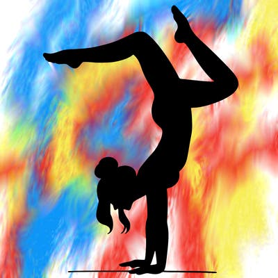 a woman doing a handstand