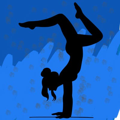 a woman doing a handstand