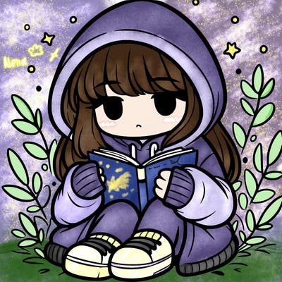 girl in oversized hoodie reading a book