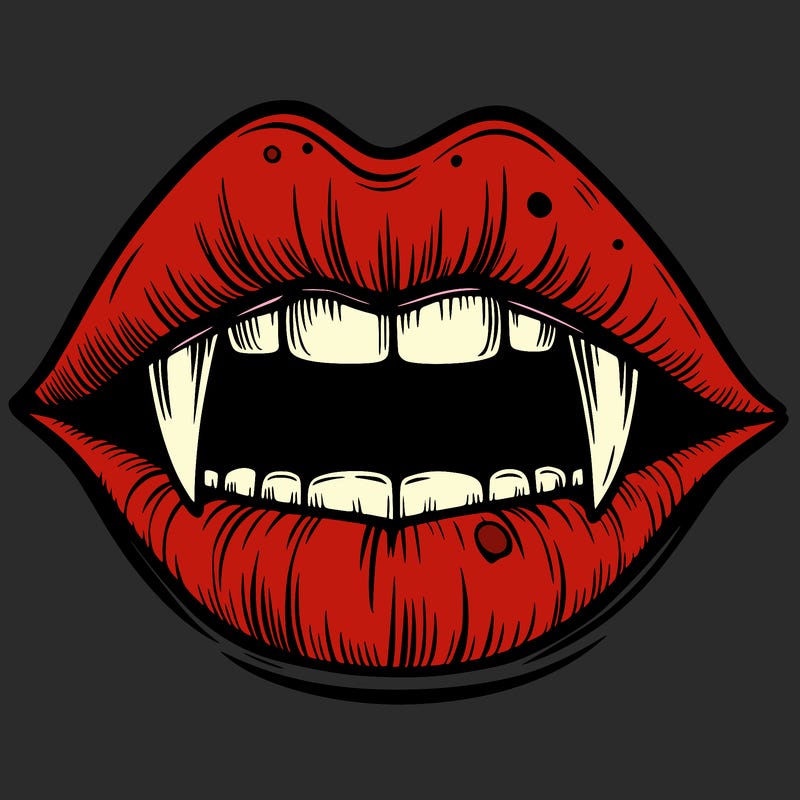 lips with vampire teeth