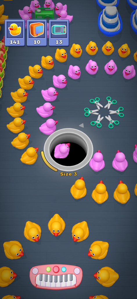Hole It 3D - A screenshot of Hole It 3D gameplay showing a black hole swallowing pink and yellow rubber ducks to fulfill level objectives.