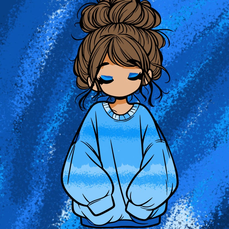 girl with baggy sweatshirt and messy bun