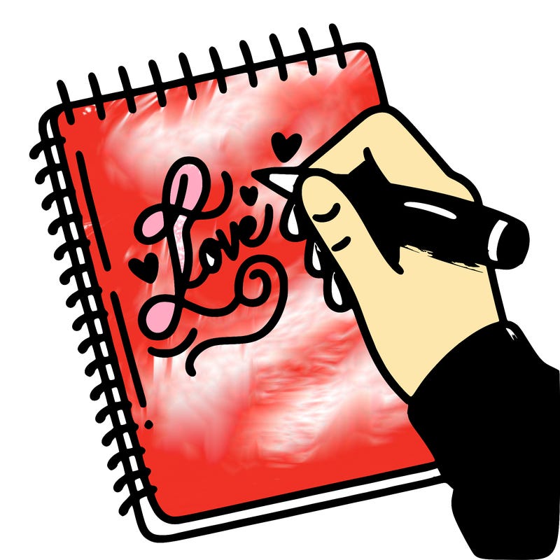 a hand writing “love” in calligraphy on a notebook