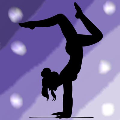 a woman doing a handstand
