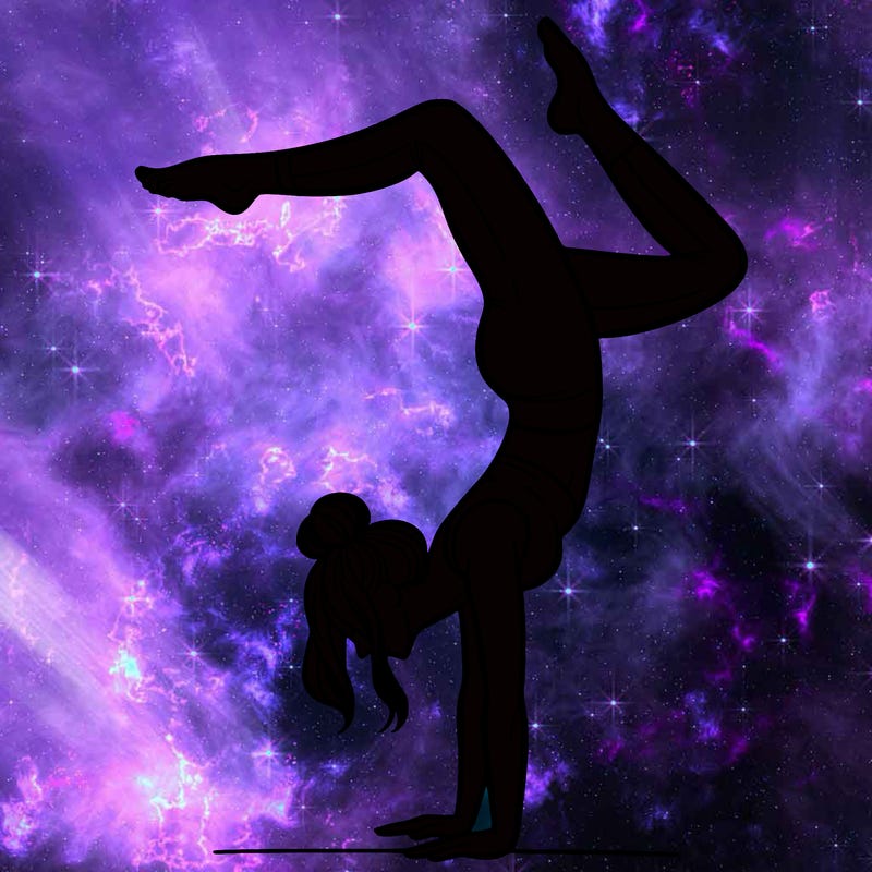 a woman doing a handstand