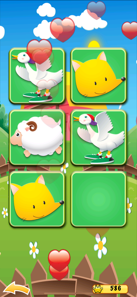 Farm Match for Kids & Toddlers - Gameplay screen of Farm Match for Kids showing animal matching cards and hearts on a farm background.