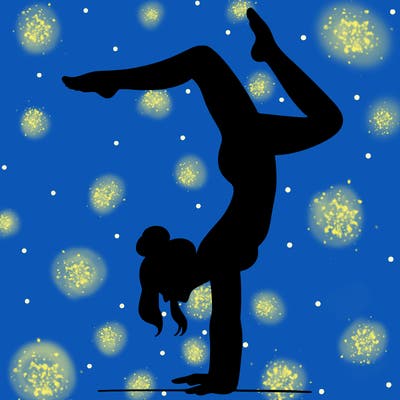 a woman doing a handstand