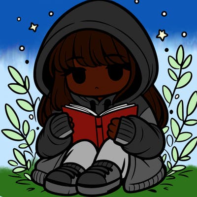girl in oversized hoodie reading a book