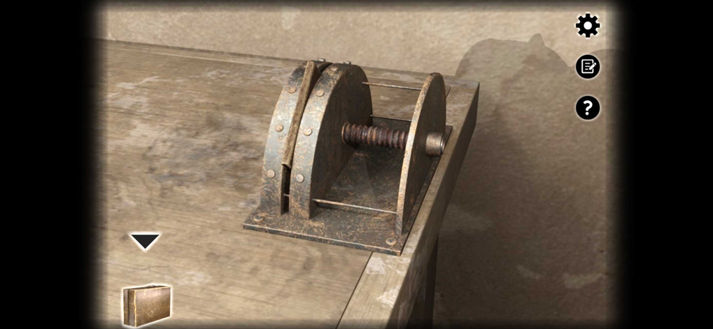 Haven - Escape Room Game - Close up of a rusty mechanical puzzle device on a wooden table in the Haven escape room game