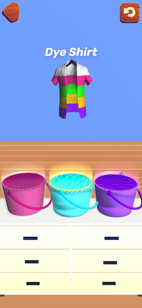 Una actividad virtual de teñido de camisetas que muestra una camiseta colorida en una percha y tres cubos de pintura vibrante.