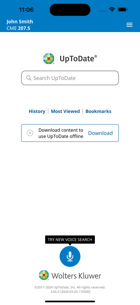 Home screen of the UpToDate medical app featuring a clinical search bar and voice search button.