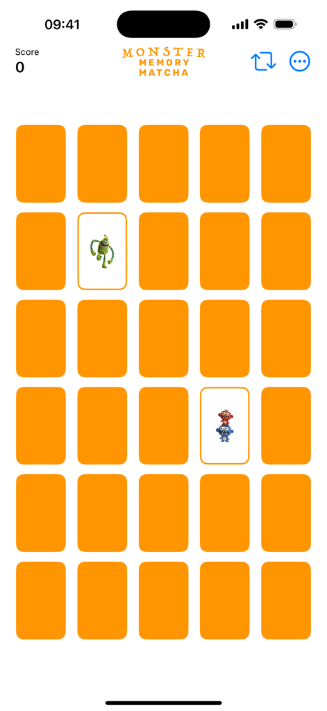 Memory Matcha - A gameplay screen of Memory Matcha showing a grid of orange cards with two monster illustrations revealed