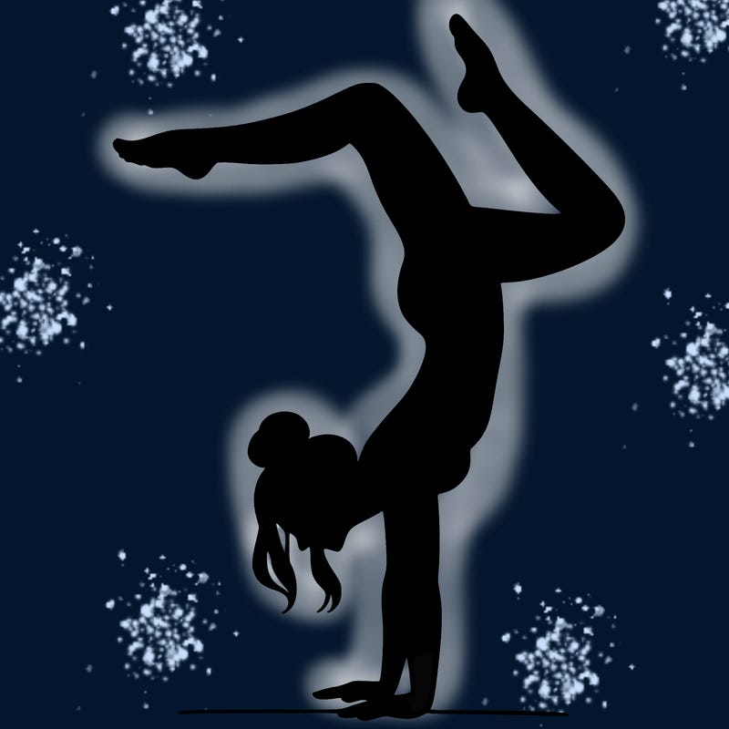 a woman doing a handstand