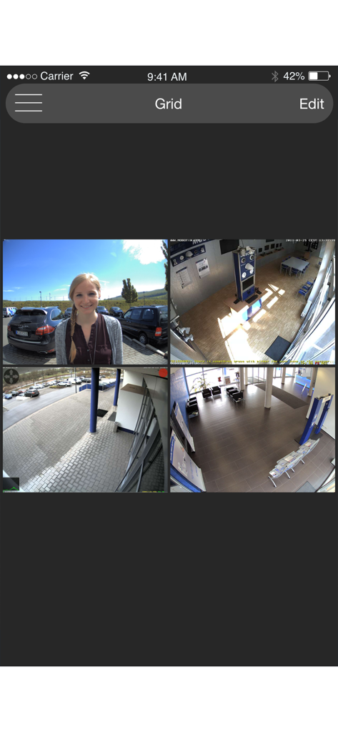 MOBOTIX LIVE - MOBOTIX LIVE app grid view displaying four security camera feeds