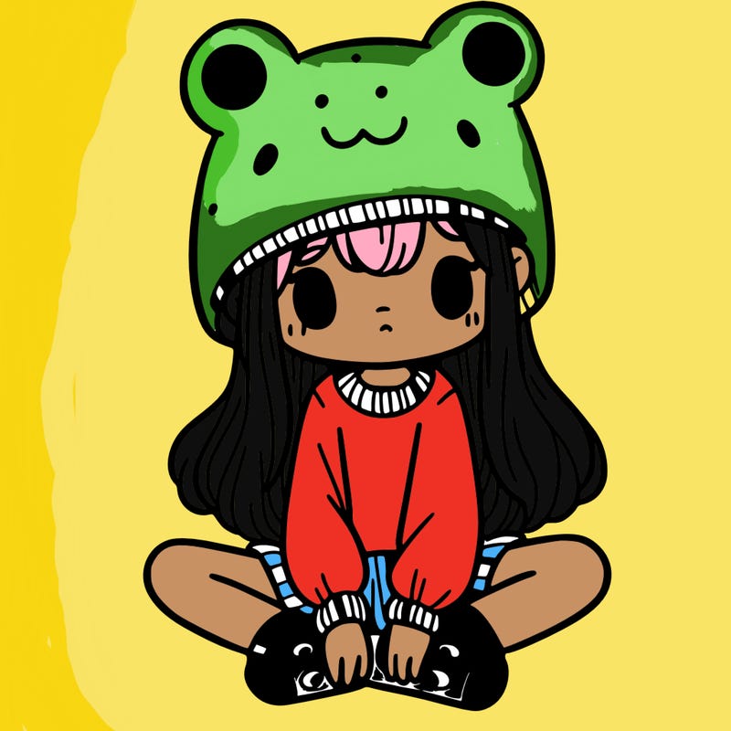 a girl wearing a frog hat and some frog socks