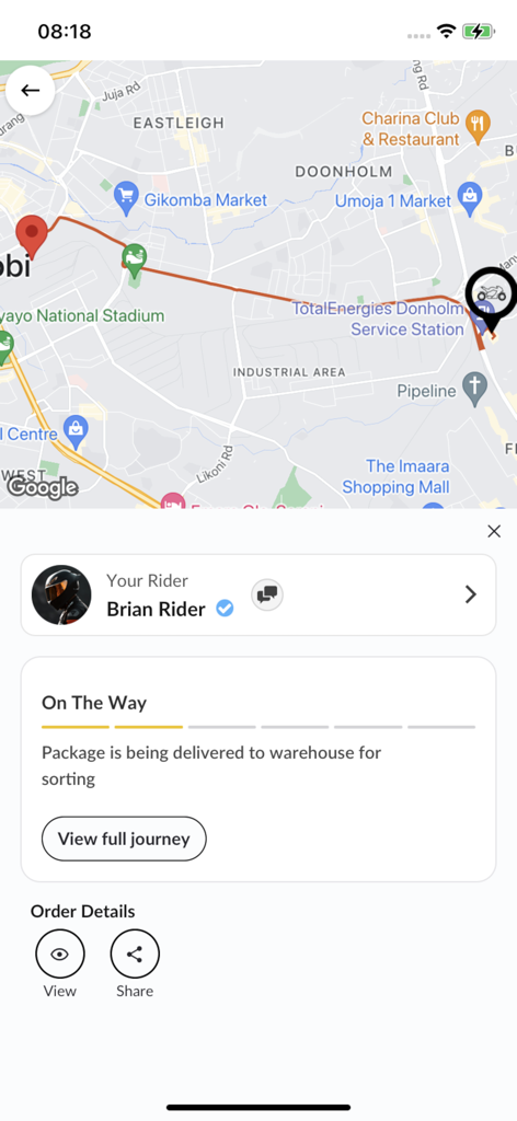 Pickup Mtaani - Pantalla de seguimiento de mapa en tiempo real para la entrega de un paquete en Nairobi que muestra el estado y la ubicación del repartidor.
