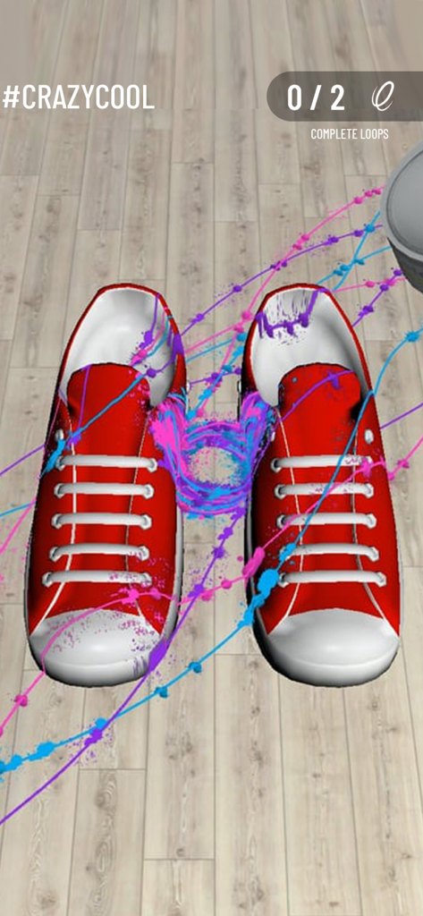 A gameplay screenshot of I Can Paint showing red sneakers being decorated with blue and pink swirling paint
