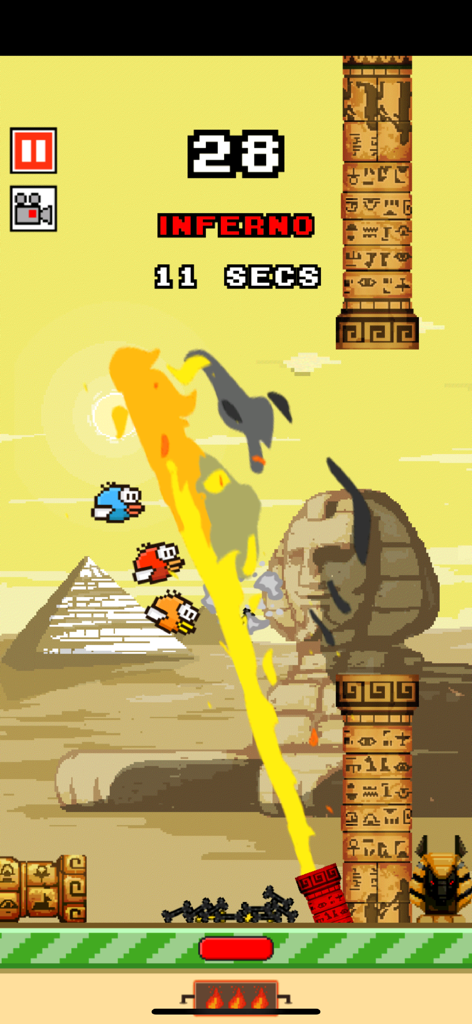 Gameplay of Flappy Crush featuring the Inferno power up in an Ancient Egypt themed level with a Sphinx and pyramids.