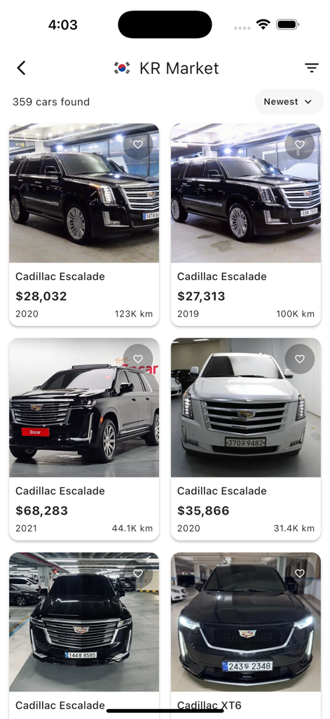 韓国の自動車市場でのキャデラック・エスカレードのリストを表示するモバイルアプリ画面。価格と走行距離が表示されています。