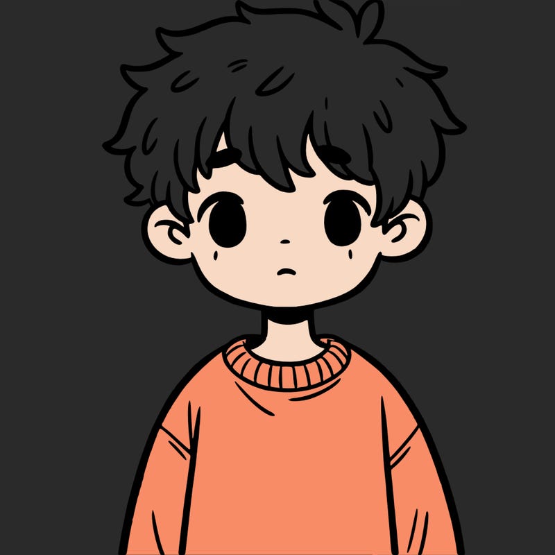 boy with messy short hair and wearing a oversized sweatshirt