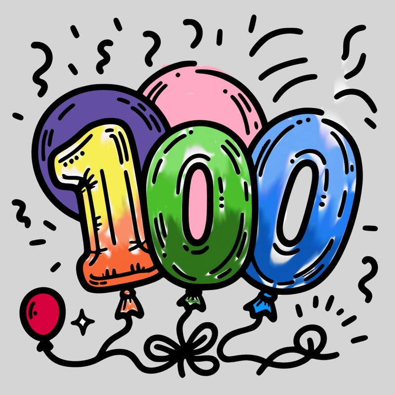 foil balloons that say “100”