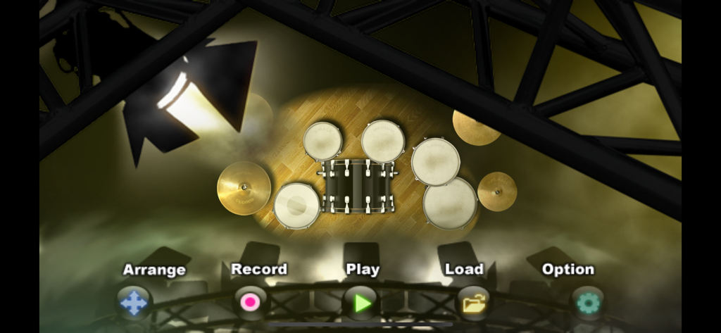 Real Drums! - Main menu of the Real Drums app showing a drum kit on a spotlighted stage with navigation buttons