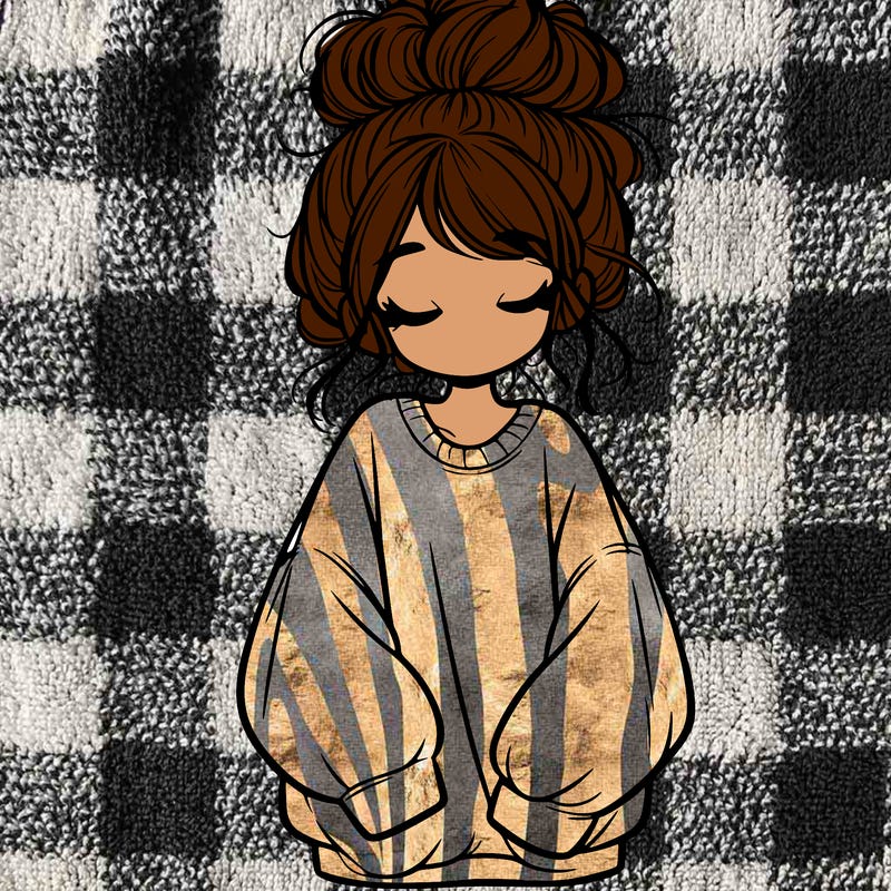 girl with baggy sweatshirt and messy bun