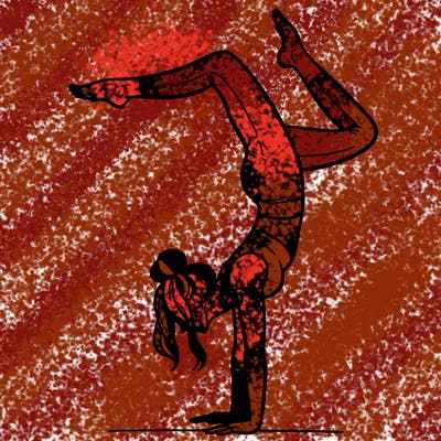 a woman doing a handstand