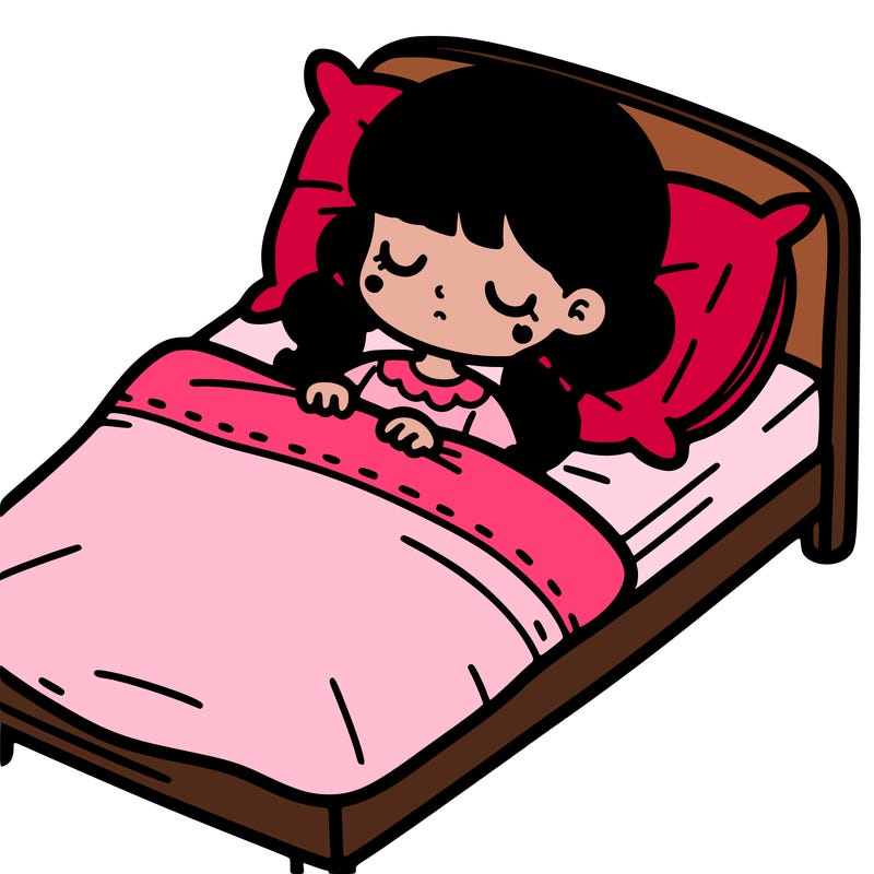 a little girl laying in bed