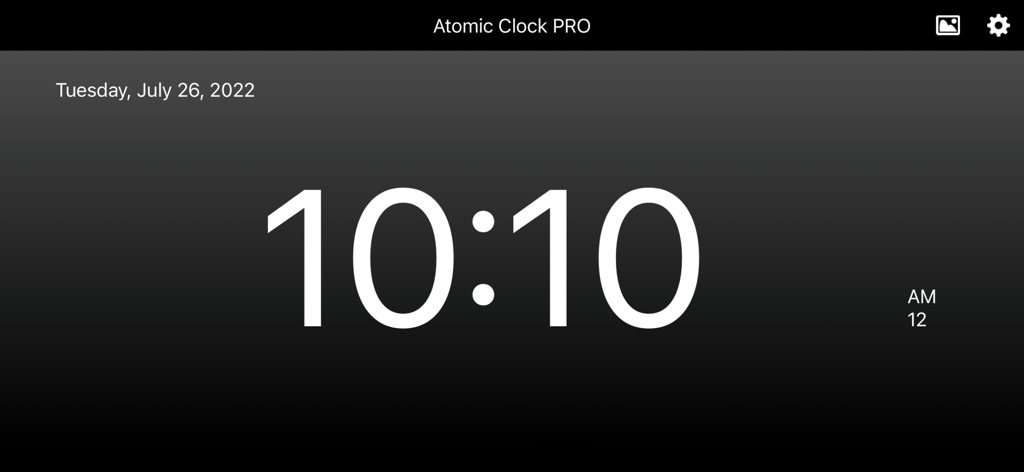 Atomic Clock PRO - Minimalist digital clock interface of the Atomic Clock PRO app in landscape mode