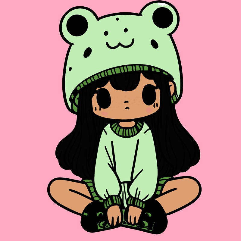 a girl wearing a frog hat and some frog socks