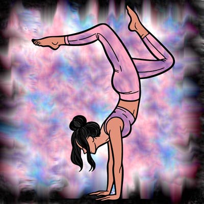 a woman doing a handstand