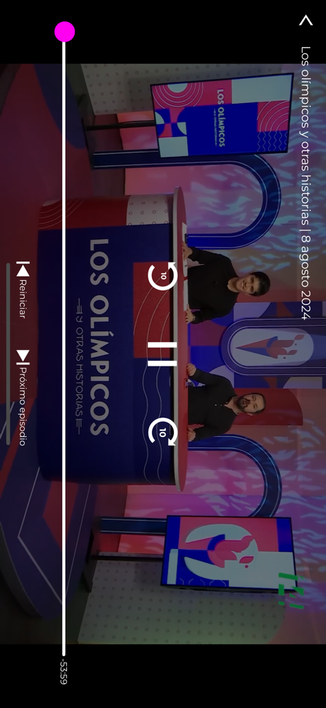 La interfaz del reproductor de video de la aplicación MXPlus mostrando una transmisión de noticias mexicana titulada Los Olimpicos