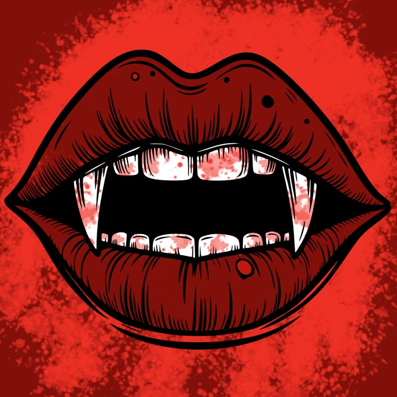 lips with vampire teeth